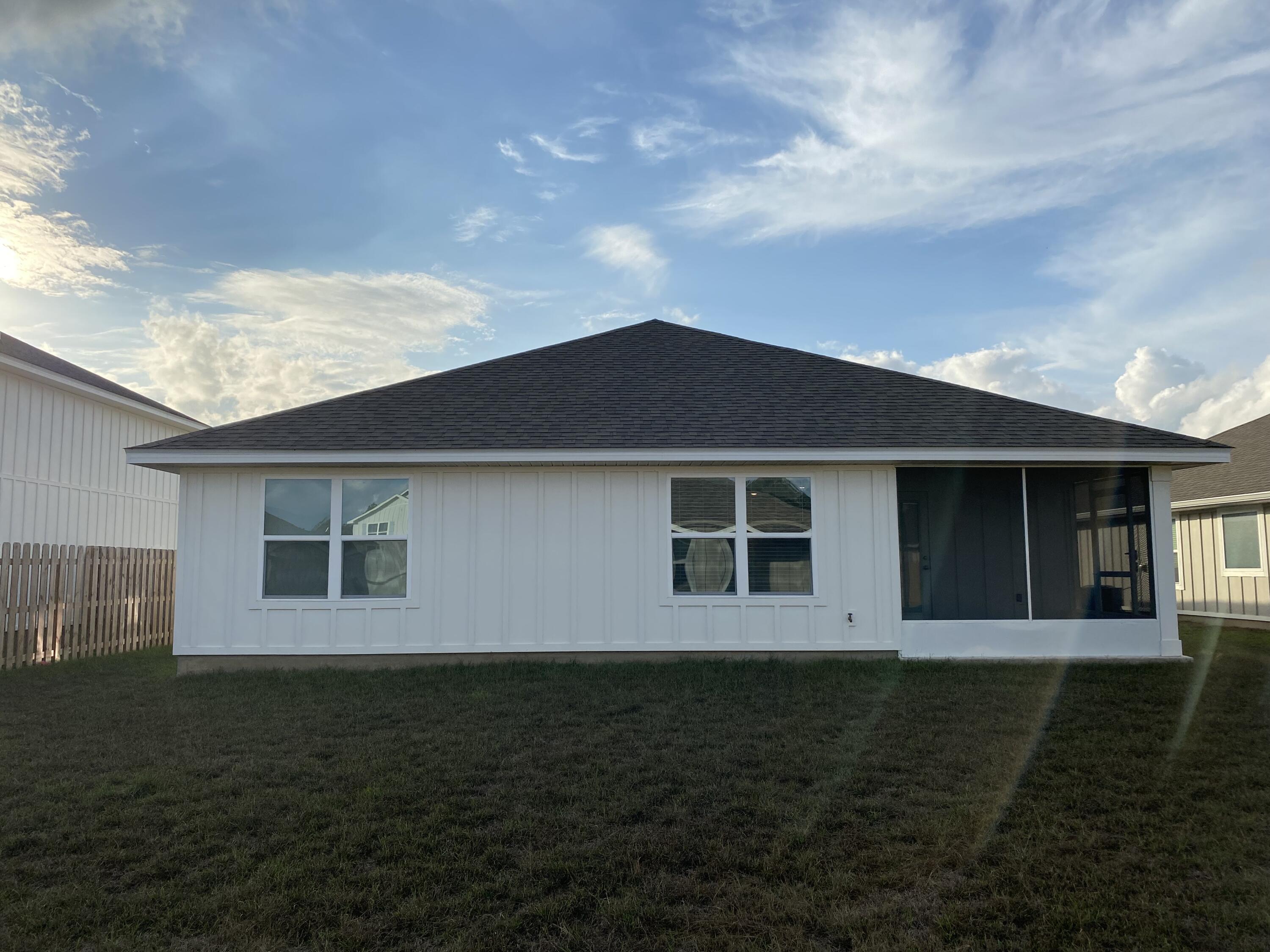 337 Flounder Street Crestview, FL 32539 - Photo 38 of 46 a house that has window in it and outdoor space