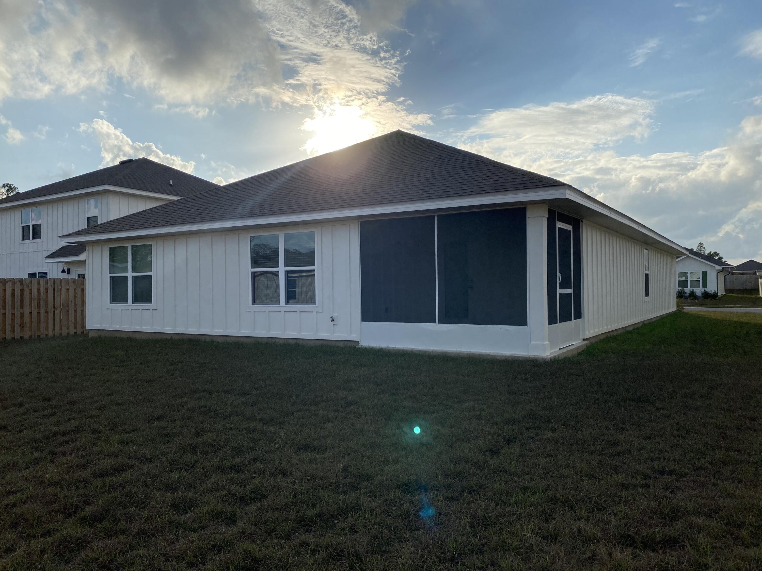 337 Flounder Street Crestview, FL 32539 - Photo 39 of 46 a house view with a garden space