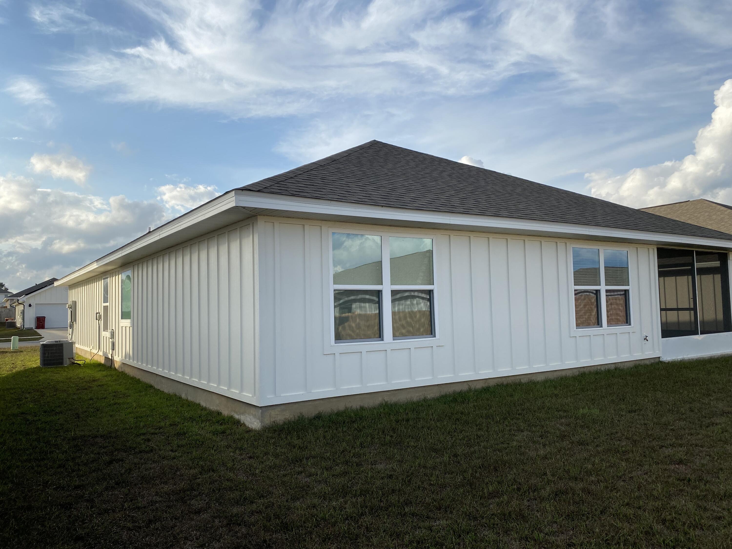 337 Flounder Street Crestview, FL 32539 - Photo 53 of 53 a backyard of a house with lots of green space