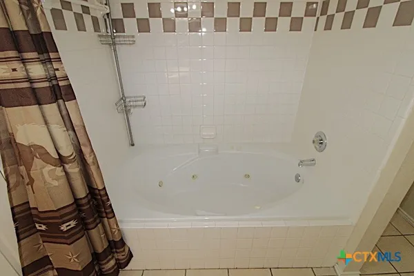 a bathroom with a bathtub
