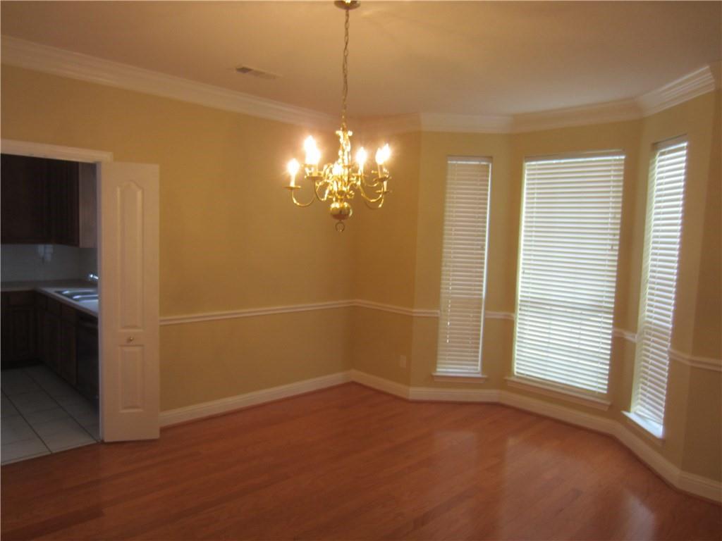 1800 Chester Drive Plano, TX 75025 - Photo 10 of 14 a view of a room with a windows and ceiling fan