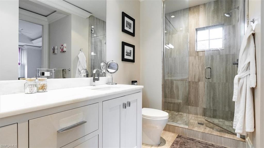 1935 7th Street South Naples, FL 34102 - Photo 22 of 27 bedroom suite's bathroom