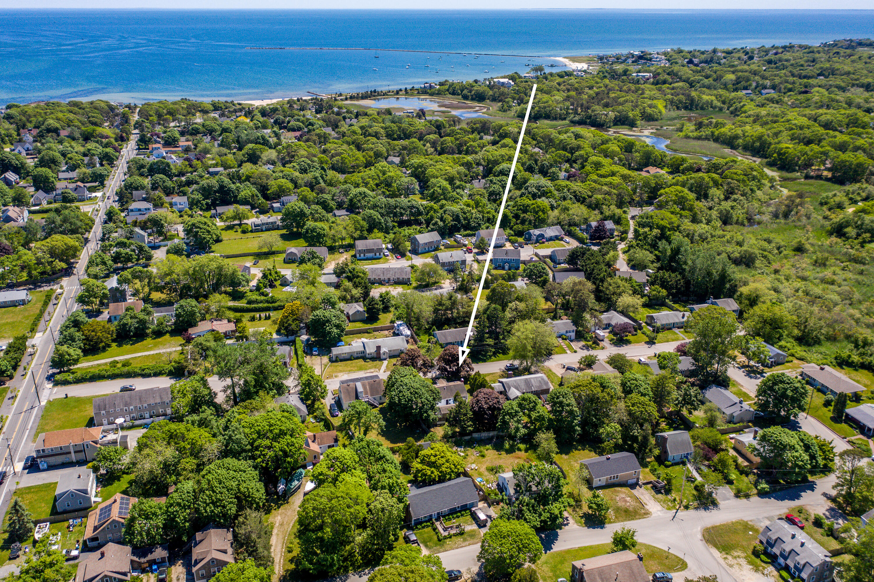40 Seabrook Road Hyannis, MA 02601 - Photo 1 of 45 an aerial view of residential houses with outdoor space and trees