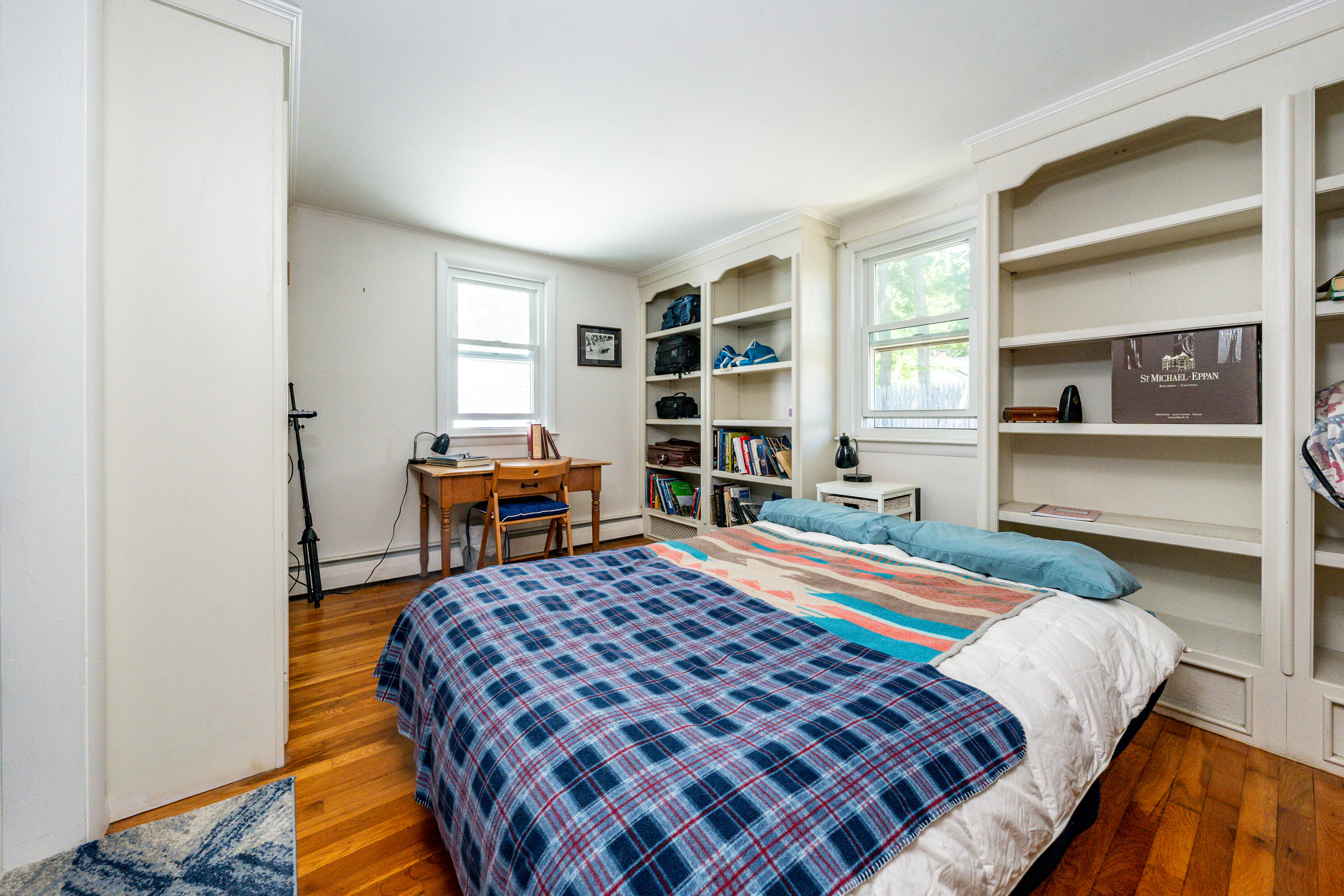 40 Seabrook Road Hyannis, MA 02601 - Photo 12 of 45 a bedroom with a bed and a cabinets