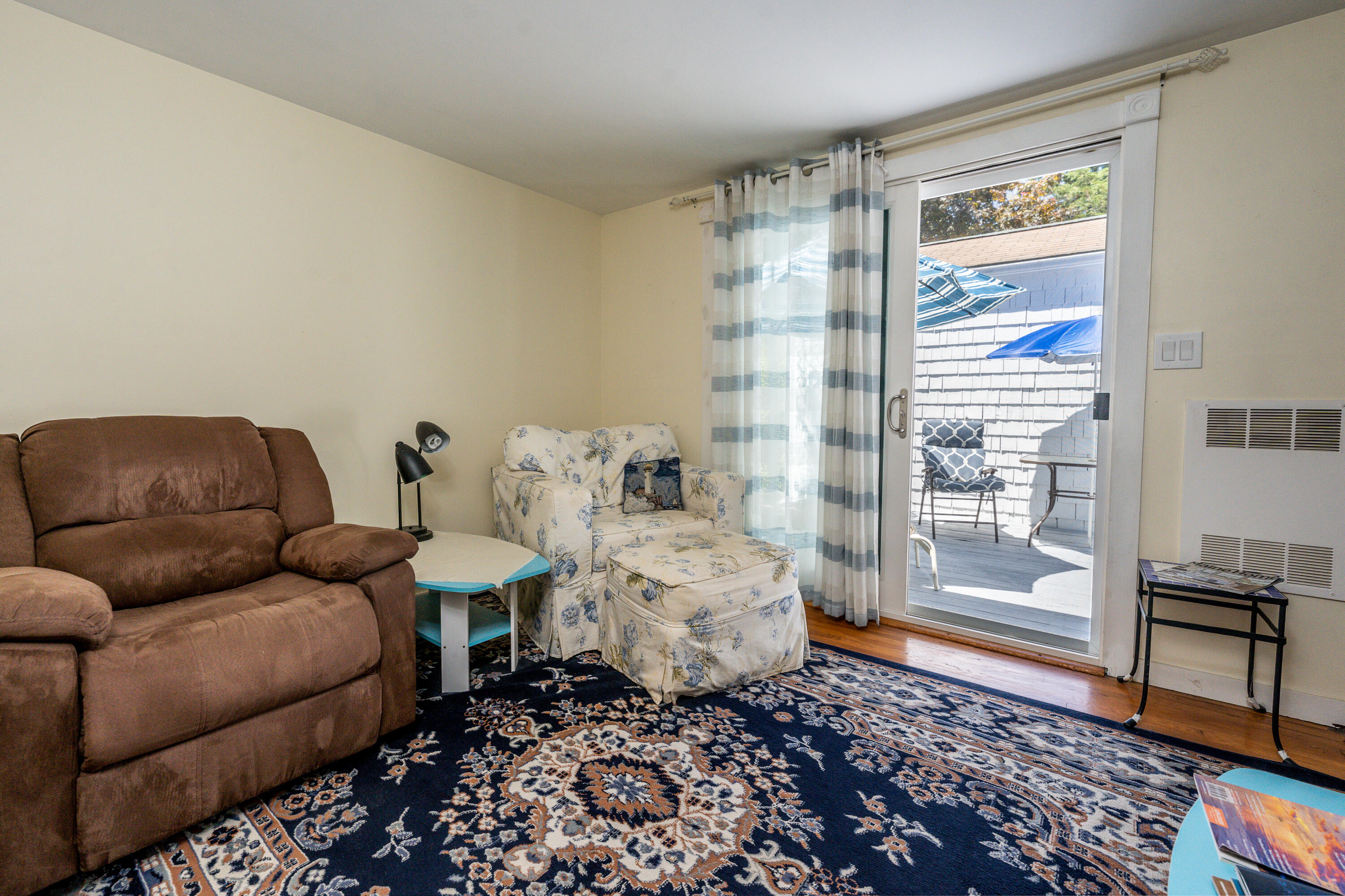 40 Seabrook Road Hyannis, MA 02601 - Photo 15 of 45 a living room with furniture and a rug