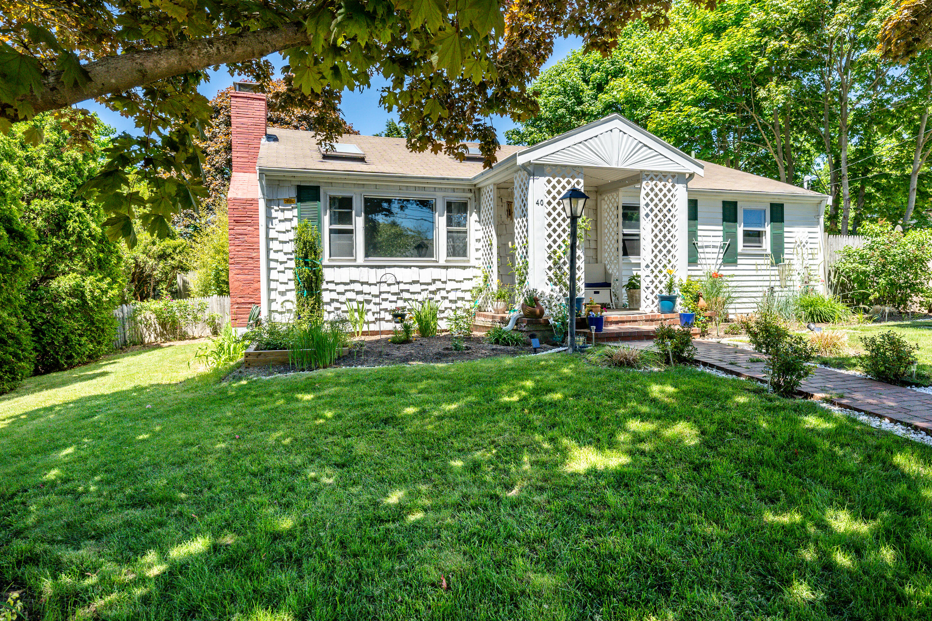 40 Seabrook Road Hyannis, MA 02601 - Photo 2 of 45 a front view of a house with garden