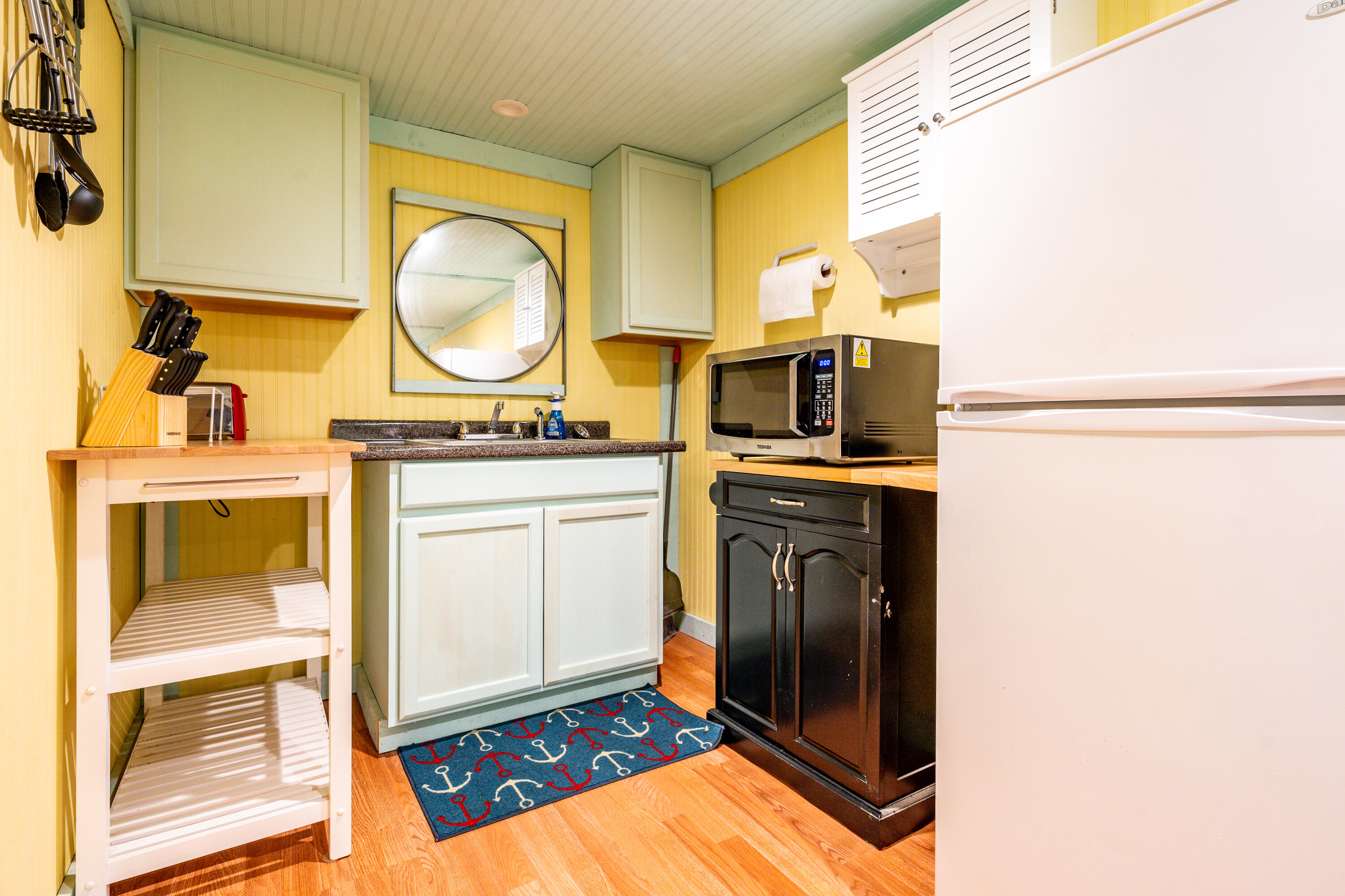 40 Seabrook Road Hyannis, MA 02601 - Photo 22 of 45 a kitchen with a sink cabinets and appliances