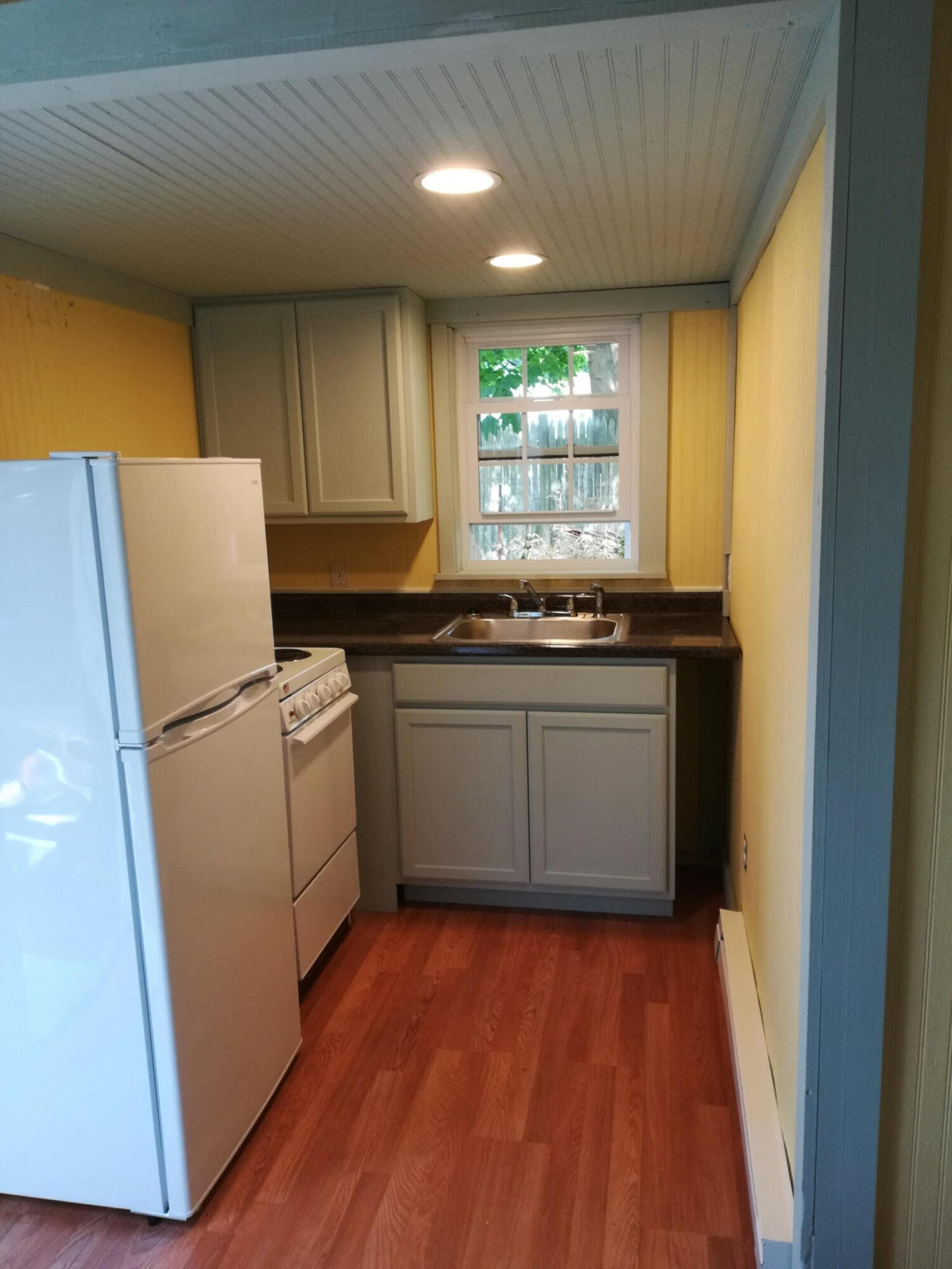 40 Seabrook Road Hyannis, MA 02601 - Photo 29 of 45 a kitchen with a sink a refrigerator and window