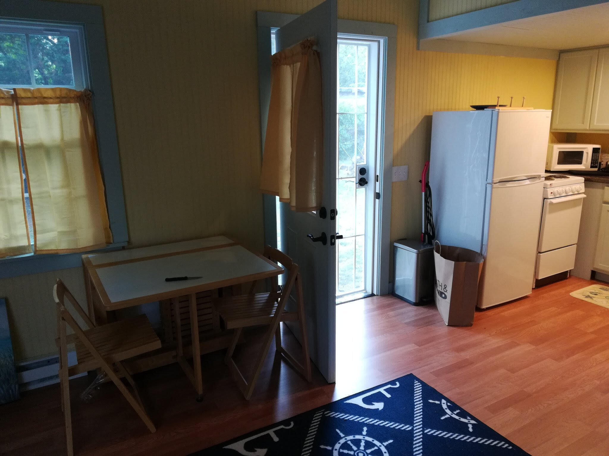 40 Seabrook Road Hyannis, MA 02601 - Photo 32 of 45 a kitchen with a refrigerator and a stove top oven