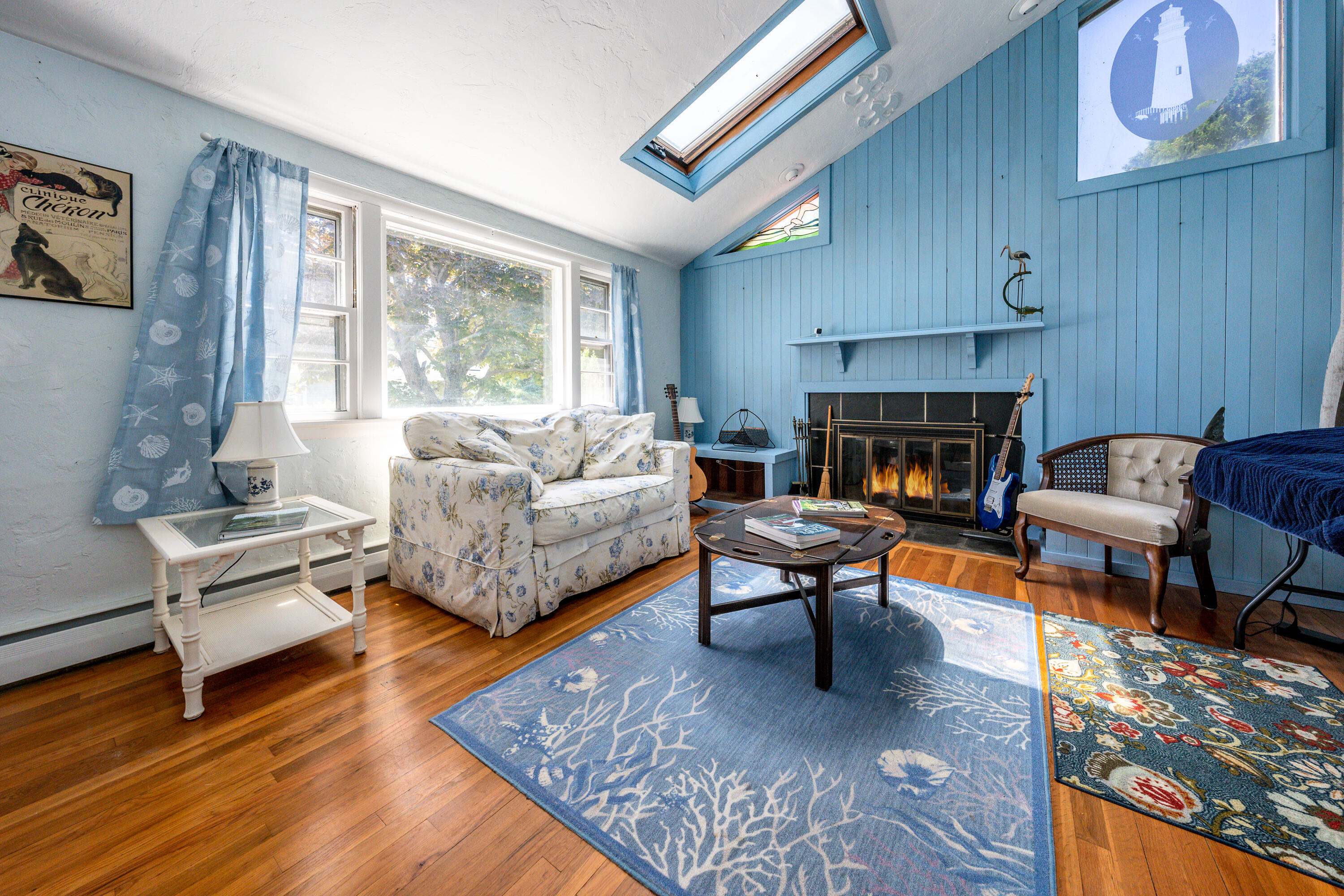 40 Seabrook Road Hyannis, MA 02601 - Photo 4 of 45 a living room with furniture and a fireplace