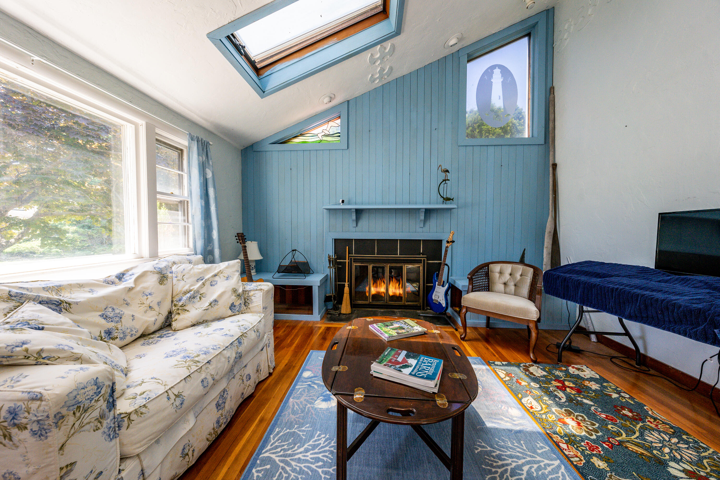 40 Seabrook Road Hyannis, MA 02601 - Photo 5 of 45 a living room with furniture and a fireplace