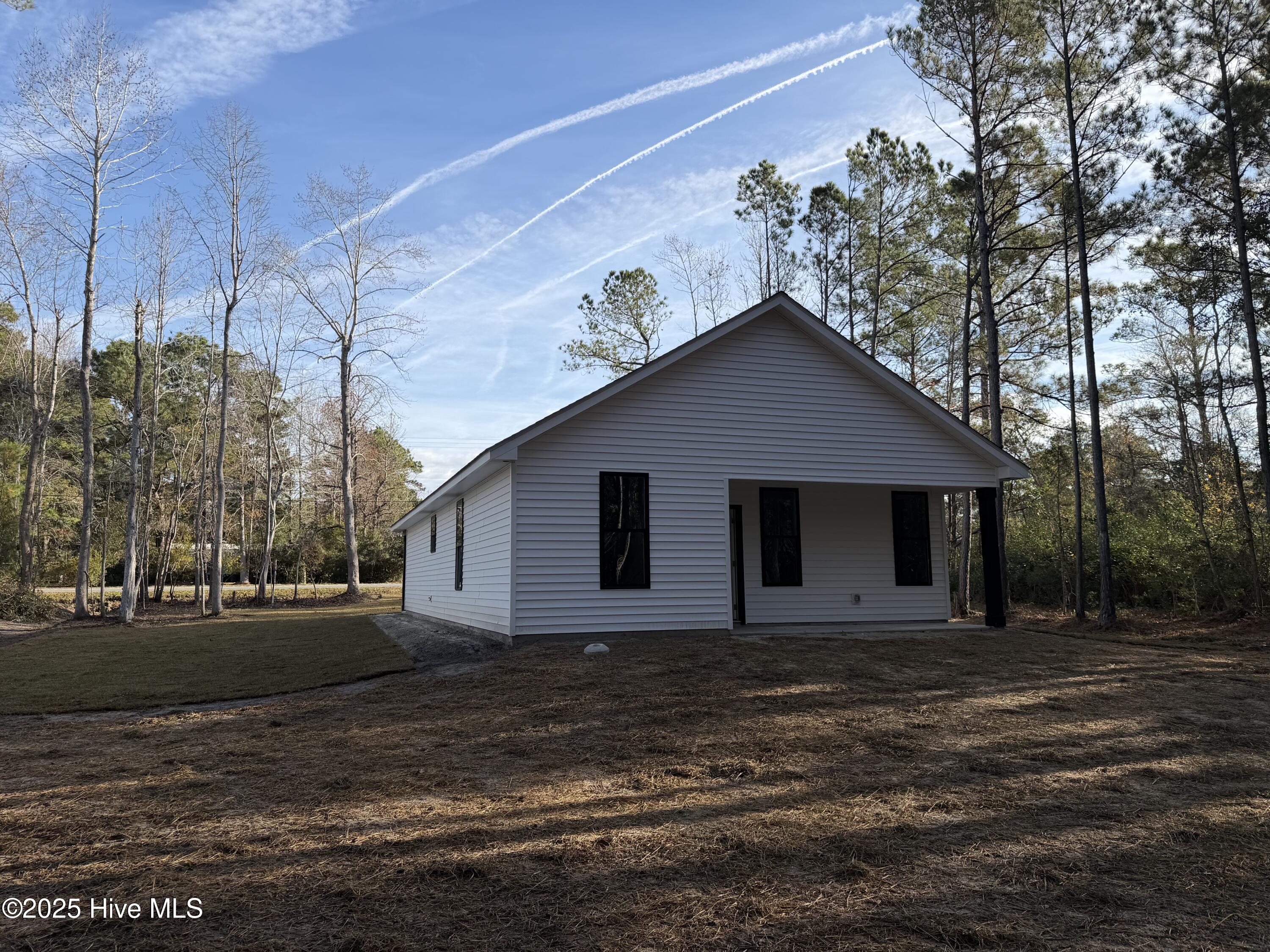 1152 Watts Landing Road Hampstead, NC 28443 - Photo 14 of 17 Covered Back Porch