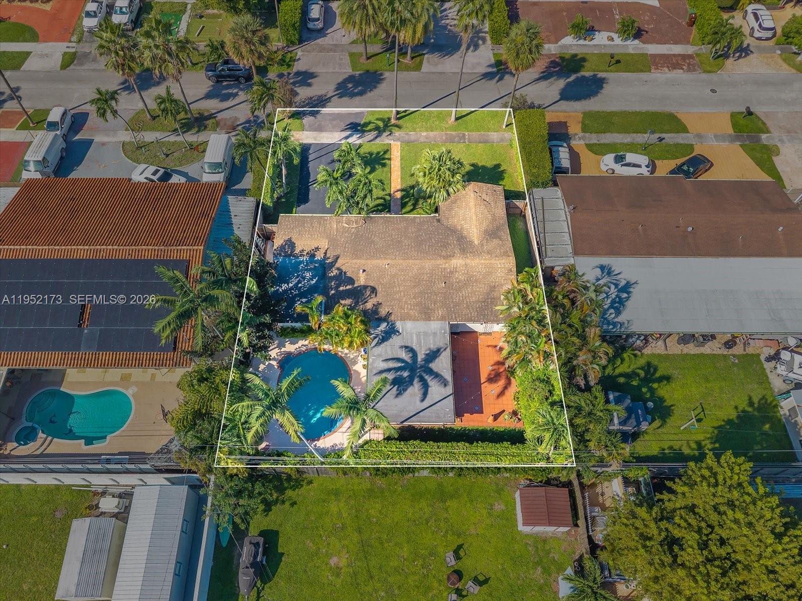 1300 West 77th Street Hialeah, FL 33014 - Photo 36 of 41 an aerial view of residential houses with outdoor space and swimming pool