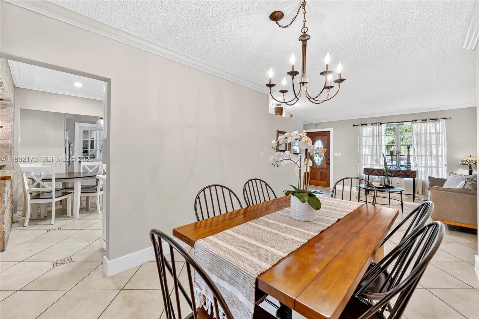 1300 West 77th Street Hialeah, FL 33014 - Photo 8 of 41 a view of a dining room with furniture window and outside view
