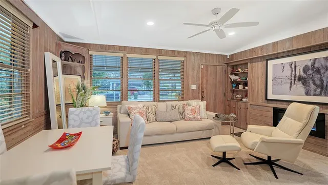 a kitchen with stainless steel appliances a stove sink microwave and cabinets