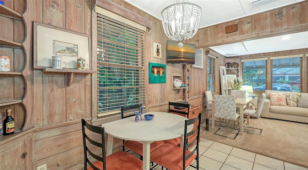1702 Hillview Street Sarasota, FL 34239 - Photo 22 of 67 a view of a dining room with furniture window and outside view