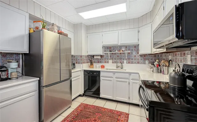 a bedroom with a bed and a cabinets