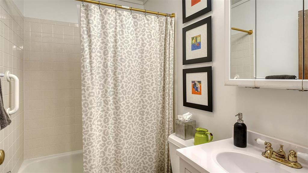 1702 Hillview Street Sarasota, FL 34239 - Photo 33 of 67 a bathroom with a sink and a mirror