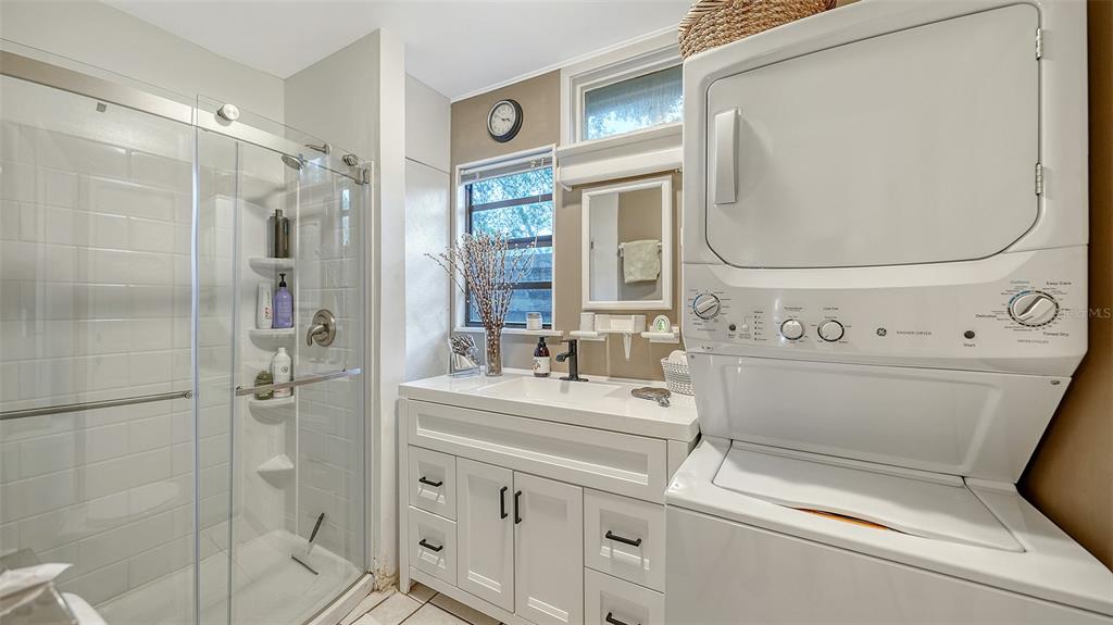 1702 Hillview Street Sarasota, FL 34239 - Photo 38 of 67 a bathroom with a sink a toilet and shower