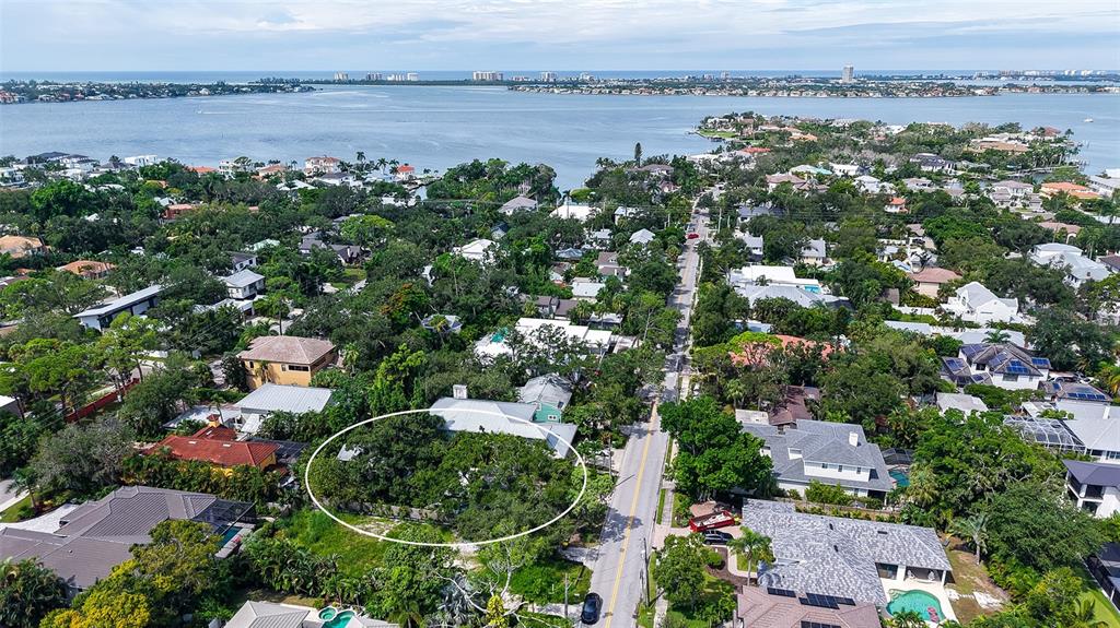1702 Hillview Street Sarasota, FL 34239 - Photo 40 of 67 an aerial view of a house with a lake view