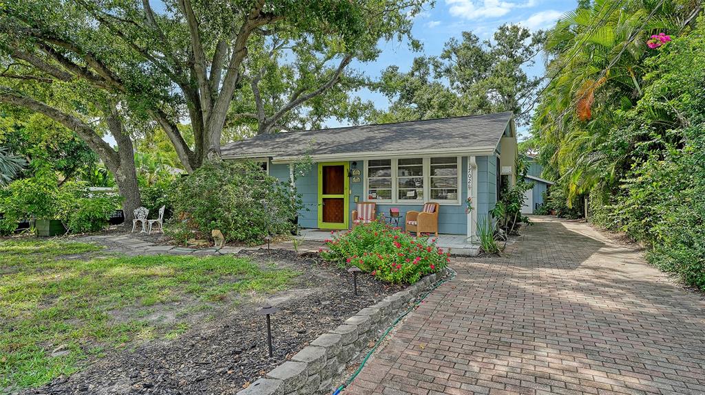 1702 Hillview Street Sarasota, FL 34239 - Photo 45 of 67 front view of a house with a yard
