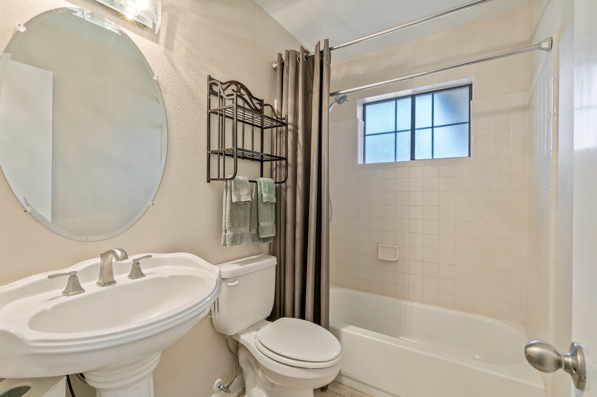 23019 Rothwood Road Spring, TX 77389 - Photo 21 of 30 a bathroom with a sink toilet and shower