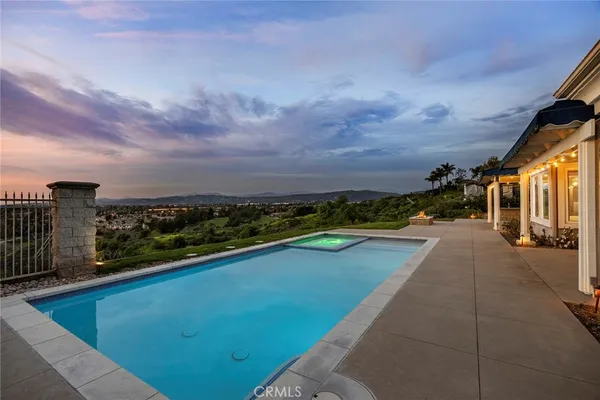 a view of a house with a swimming pool