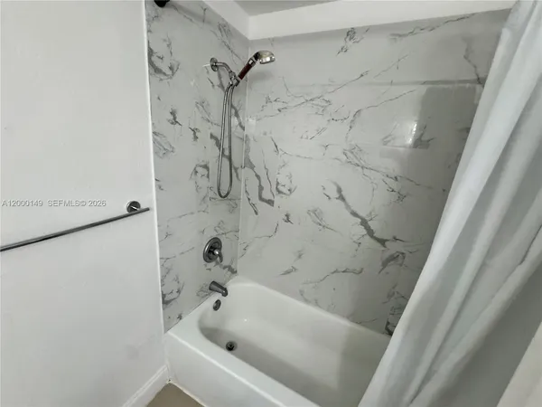 a bathroom with a bathtub