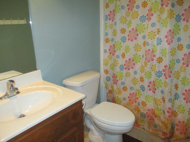 116 Nealys Way Haddock, GA 31033 - Photo 14 of 20 a bathroom with a sink and a toilet