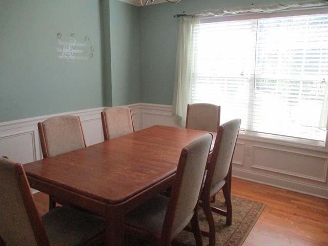 116 Nealys Way Haddock, GA 31033 - Photo 10 of 20 a view of a dining room with furniture and a window