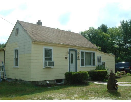 81 Papermill Road Wareham, MA 02576 - Photo 1 of 1 a view of a house with a yard