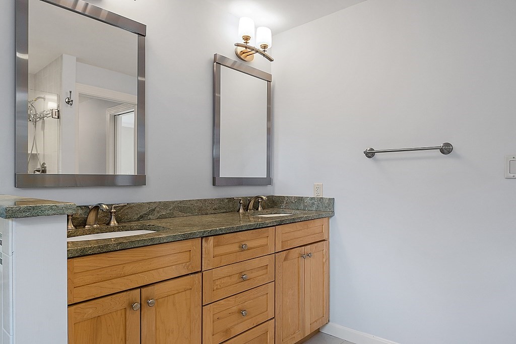 2 Sunset Ridge Lexington, MA 02421 - Photo 12 of 39 a bathroom with a granite countertop sink and a mirror