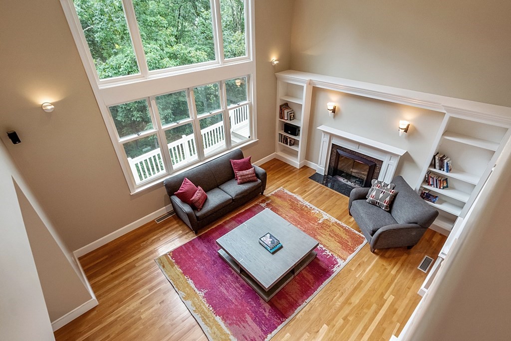 2 Sunset Ridge Lexington, MA 02421 - Photo 21 of 39 a living room with furniture and a fireplace