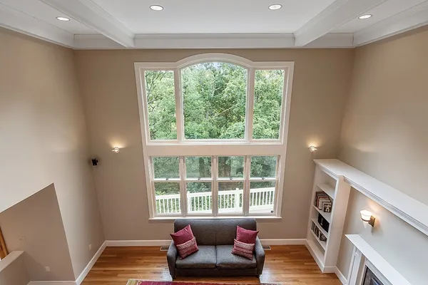 a living room with furniture and a rug