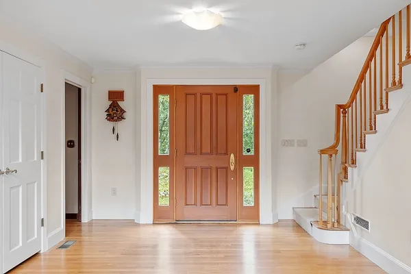 a view of entryway with wooden floor