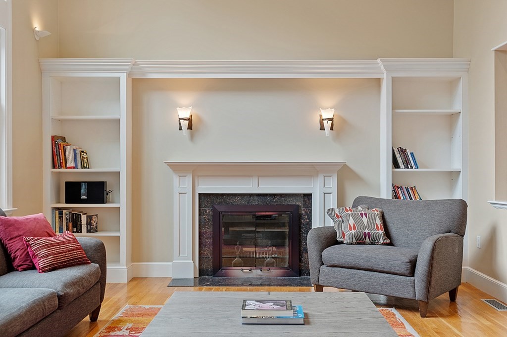 2 Sunset Ridge Lexington, MA 02421 - Photo 30 of 39 a living room with furniture and a fireplace