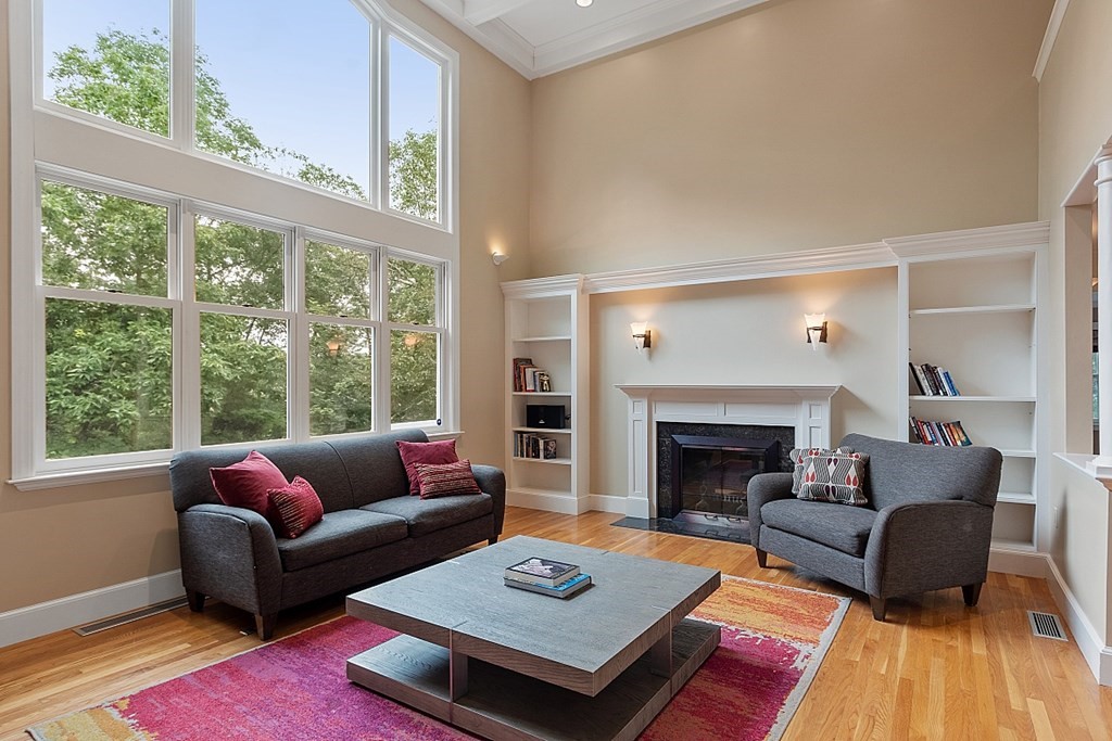 2 Sunset Ridge Lexington, MA 02421 - Photo 31 of 39 a living room with furniture and a fireplace
