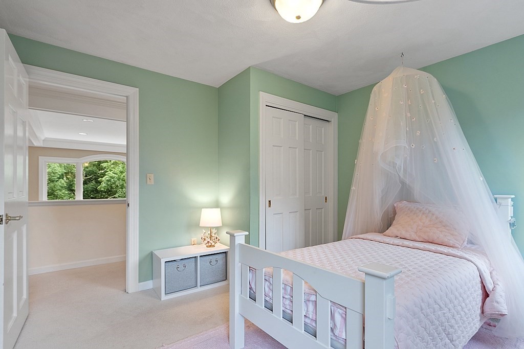 2 Sunset Ridge Lexington, MA 02421 - Photo 8 of 39 a bedroom with a bed and a window