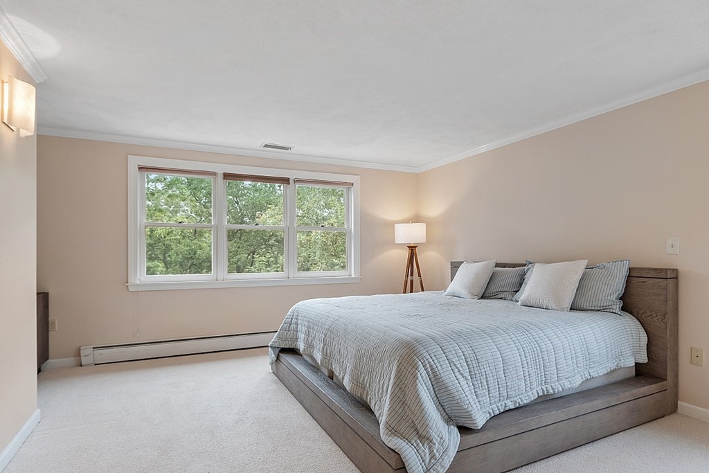 2 Sunset Ridge Lexington, MA 02421 - Photo 9 of 39 a bedroom with a bed and a window