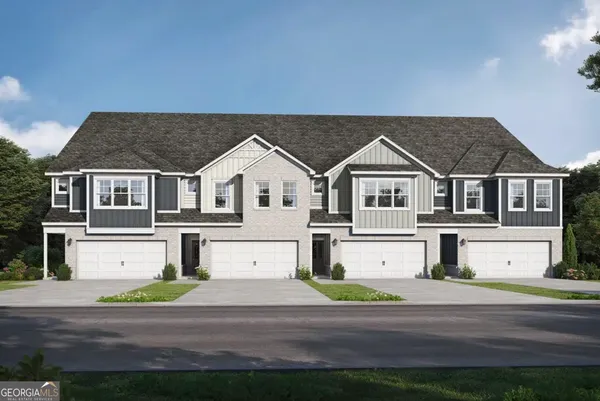 a view of residential houses with street