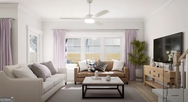 a living room with furniture a flat screen tv and a large window