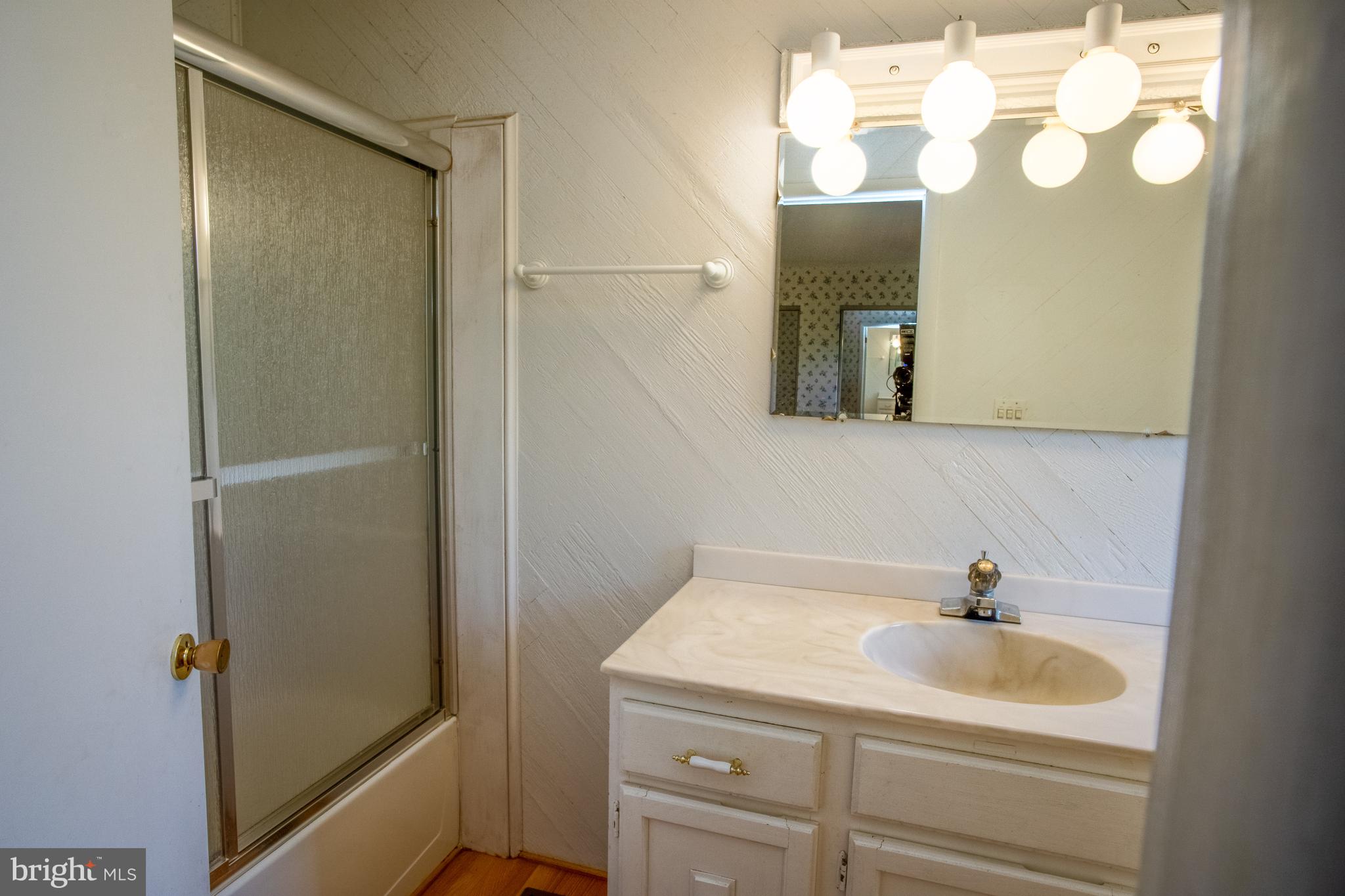 132 Union Church Road Elkton, MD 21921 - Photo 12 of 41 a bathroom with a sink and a mirror