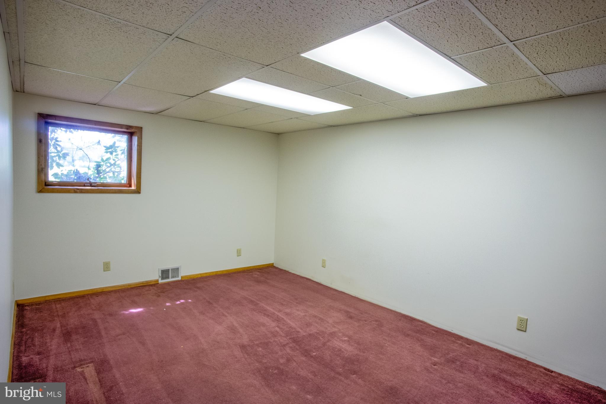 132 Union Church Road Elkton, MD 21921 - Photo 18 of 41 an empty room with a workbench