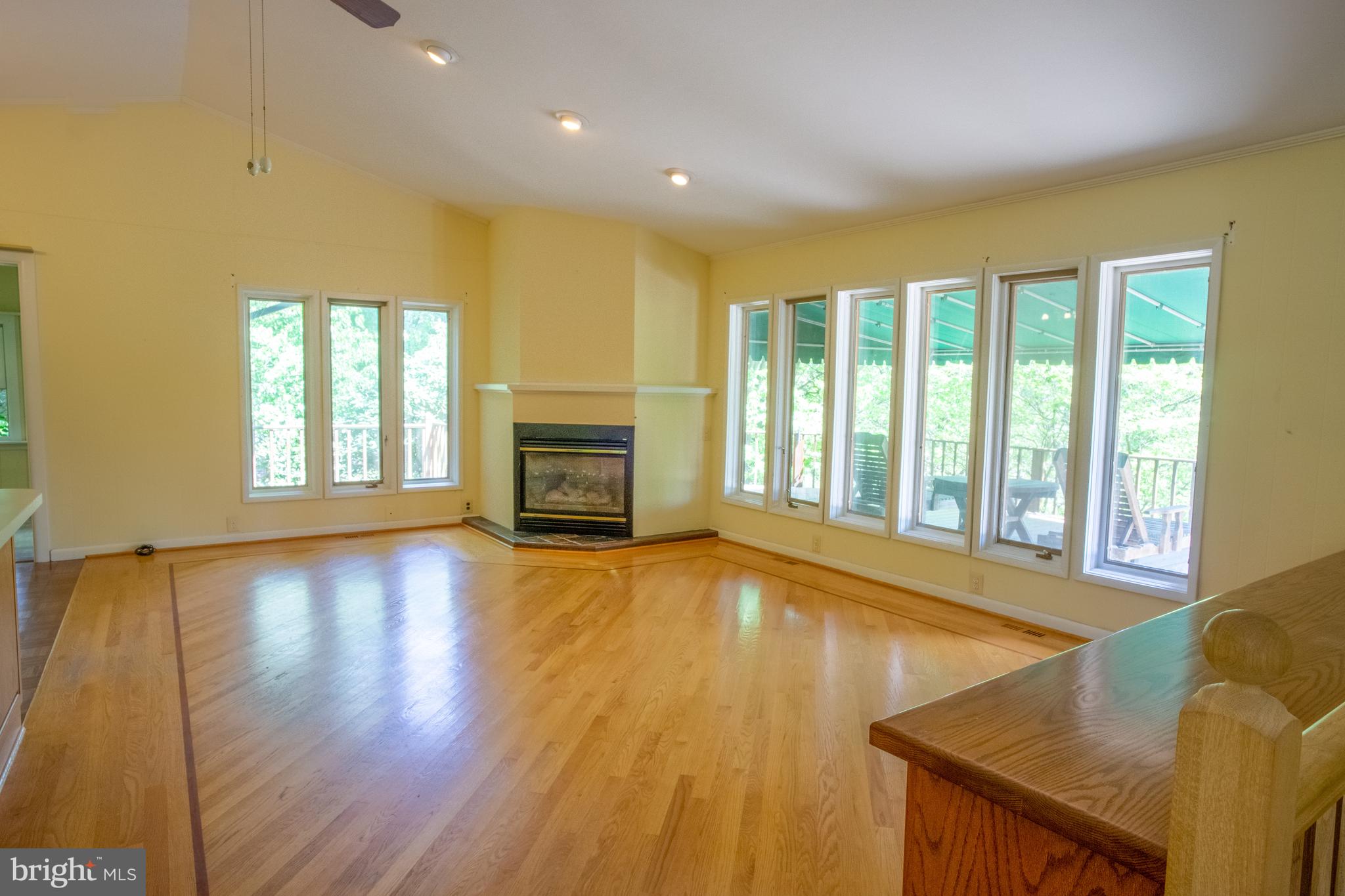 132 Union Church Road Elkton, MD 21921 - Photo 4 of 41 a view of an empty room with wooden floor and a window
