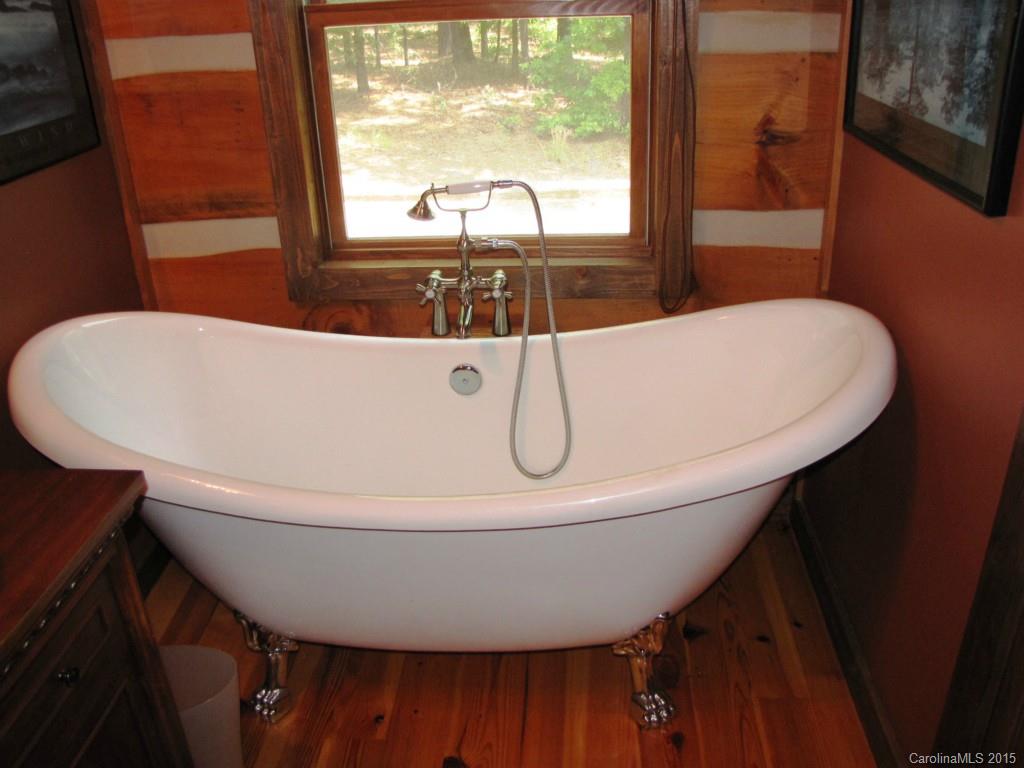 395 Tallow Road, Unit 11 Ridgeway, SC 29130 - Photo 12 of 24 a view of a bathtub in a room