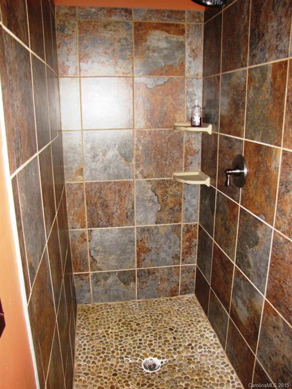 395 Tallow Road, Unit 11 Ridgeway, SC 29130 - Photo 13 of 24 a bathroom with a shower