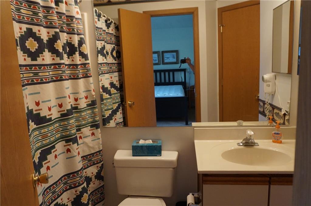 Y12 Sunridge Road Champion, PA 15622 - Photo 13 of 15 a bathroom with a sink toilet and shower