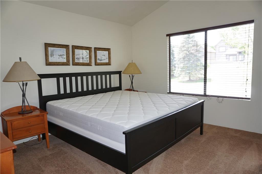 Y12 Sunridge Road Champion, PA 15622 - Photo 10 of 15 a bed sitting in a bedroom next to a window