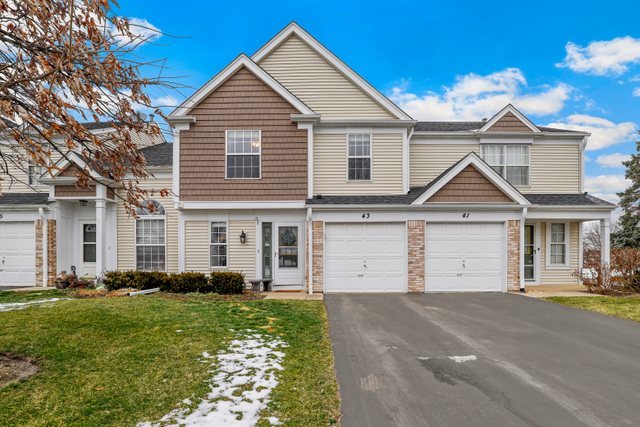 43 North Oltendorf Road Streamwood, IL 60107 - Photo 1 of 22 a front view of a house with a yard