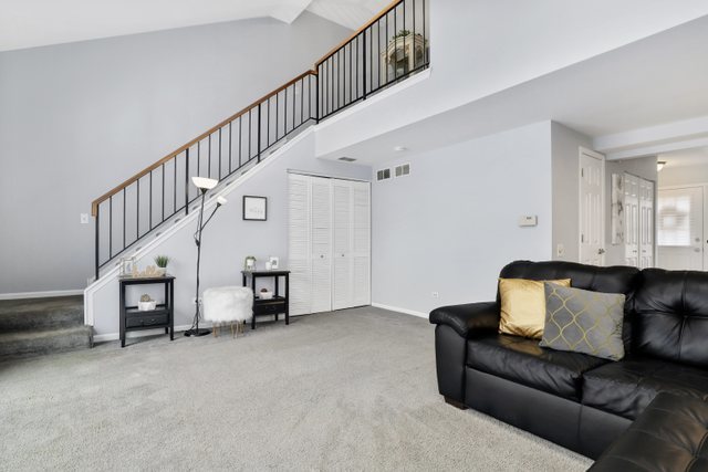 43 North Oltendorf Road Streamwood, IL 60107 - Photo 11 of 22 a living room with furniture and a lamp